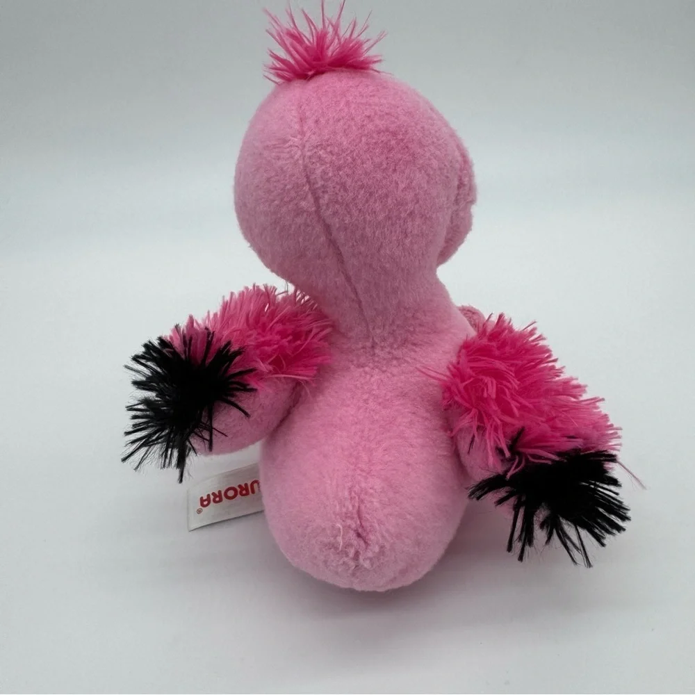 Pink Stuffed Animal Toy with Rainbow Beak
